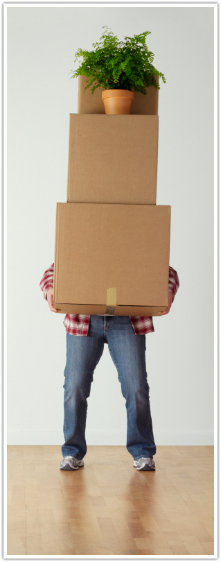 Man holding self storage boxes